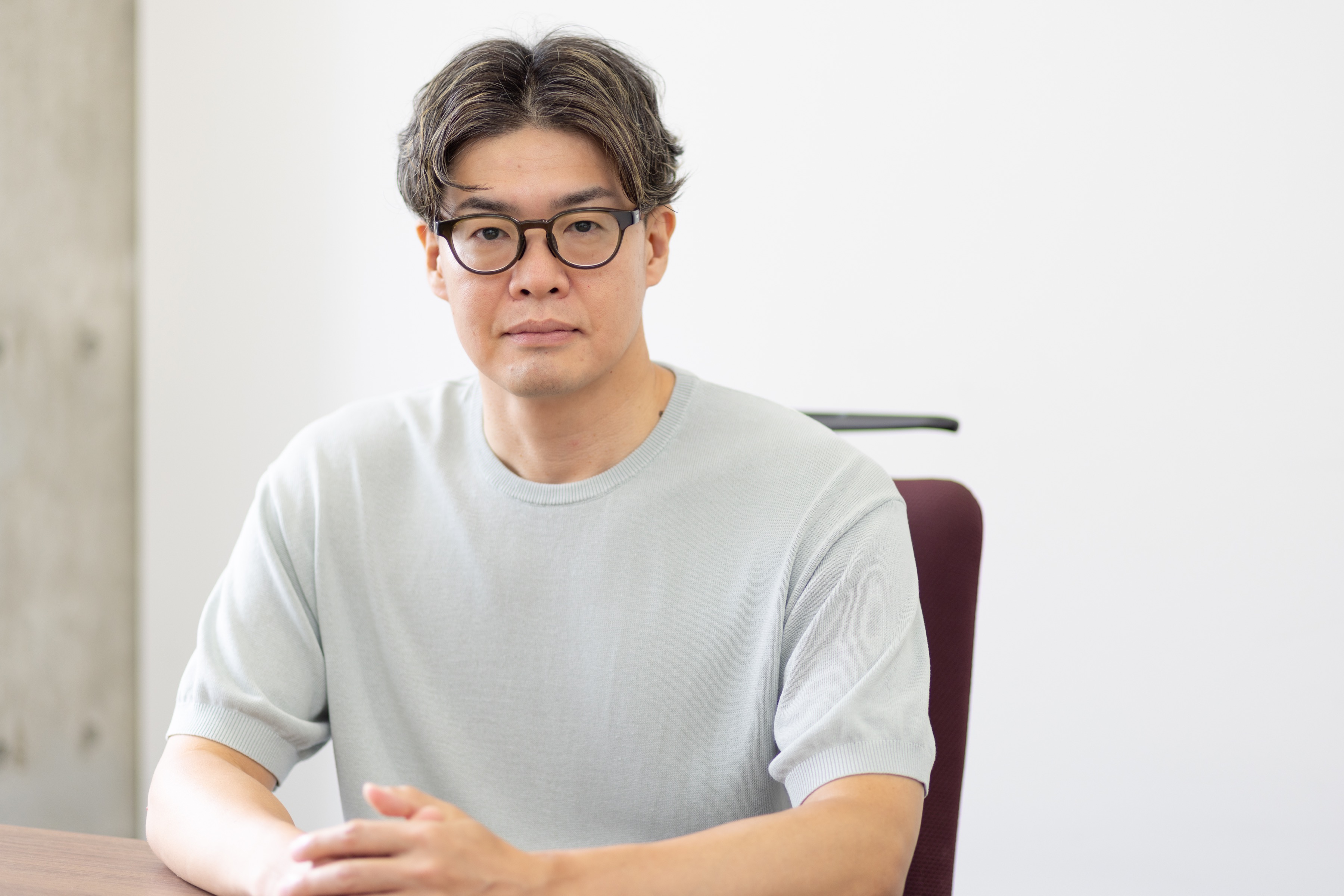 オフィスで働くH.Sさん